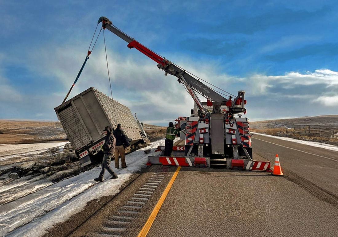 Truck-Rollovers-and-Wrecks-Recovery-Boise-Idaho-B-W-Wrecker-Service-Uprighting-a-trailer-on-the-highway Truck Rollovers and Wrecks Recovery B W Wrecker Boise Uprighting a trailer on the highway
